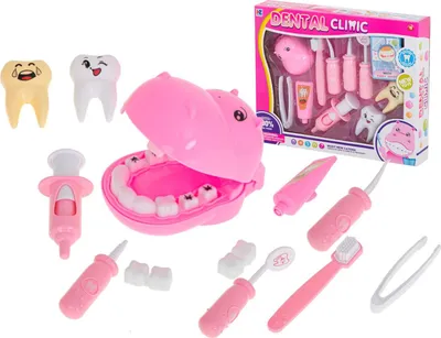 A collection of toy dental clinic accessories, including a pink hippo-shaped mouth model, teeth, and various dental tools, displayed against a white background. A box labeled 'DENTAL CLINIC' is also visible.