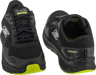Two black Skechers Go Run running shoes are displayed against a white background.