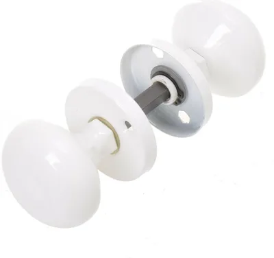 A disassembled white doorknob set with rosette, bolt, and screws on a white background.