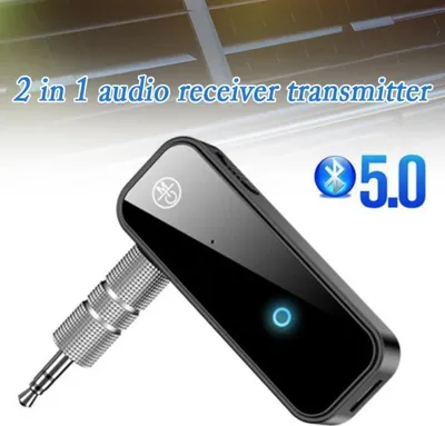 A black Bluetooth 5.0 audio receiver/transmitter with a silver 3.5mm jack is shown against a light gray and white background.