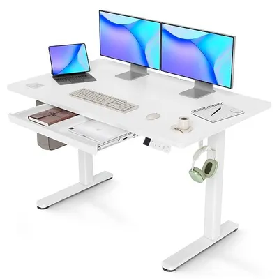 Imagen del producto de Escritorio de altura ajustable de 120x60 cm con cajón, capacidad de carga de 80 kg, eléctrico. Escritorio de altura ajustable con memoria de 3 funciones y 2 ganchos para auriculares. Escritorio de pie con cajón, color blanco