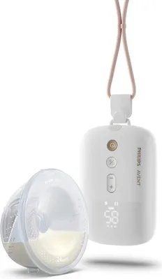 A white Philips Avent breast pump motor unit with a pink lanyard and a clear breast pump flange with milk inside, shown against a white background.