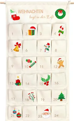 A fabric advent calendar with 24 numbered pockets, each decorated with a Christmas-themed embroidered image.
