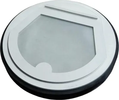 A round, white device with a gray, transparent window in the center, set against a white background.