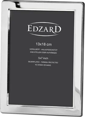 A silver picture frame with text on a black background.