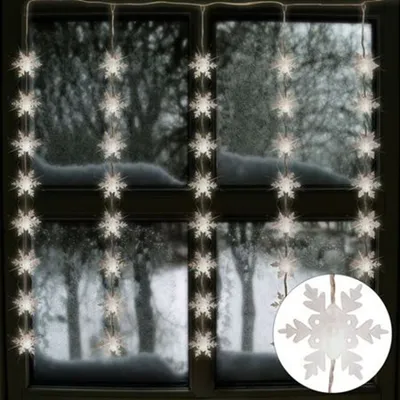Produktbild von LED Lichtervorhang Schneeflocken 75x85cm Weihnachtesdeko 40 Lichter Fensterdeko