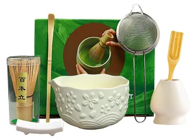 Immagine prodotto di Set per tè Matcha, beige e bianco, composto da 7 pezzi: include un frullino, una ciotola, un cucchiaino e un supporto