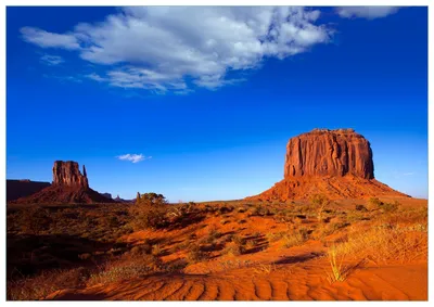 Produktbild von Wallario Premium Glasbild, freischwebende Optik, kräftige Farben, Größe 100 x 70 cm Motiv Monument Valley am Abend I