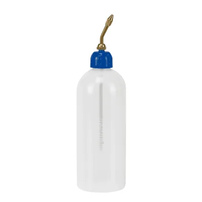 A clear studio shot of an oil can.