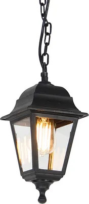 A black outdoor lantern with a glass enclosure and an exposed filament bulb, suspended by a chain.
