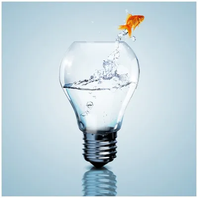 Produktbild von Wallario Möbeldesign / Aufkleber, geeignet für Ikea Lack Tisch - Goldfisch springt aus Aquarium in 55 x 55 cm