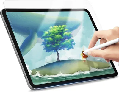 A hand is using a stylus to draw on a tablet screen, which displays a digital painting of a whale and an island with a tree.