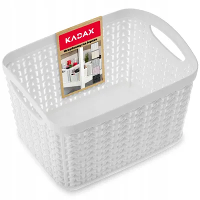 A white woven basket with a product tag attached.