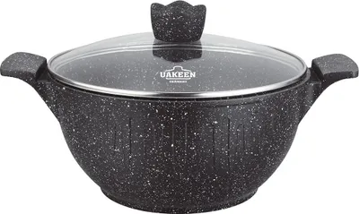 A black pot with a speckled granite ceramic coating and a glass lid sits on a white background.