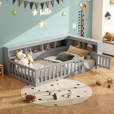 A child's bedroom with a grey corner bed, toys, and decorations.