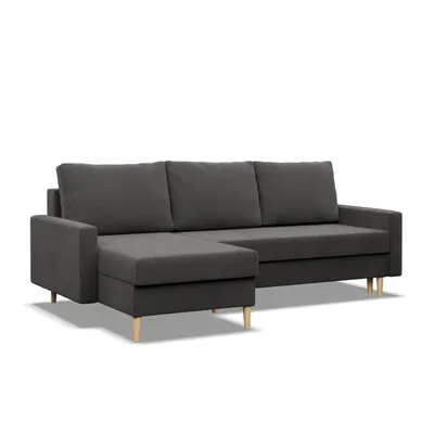 A dark gray sectional sofa with a chaise lounge is shown against a white background.