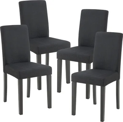 Four dark gray upholstered dining chairs with dark wooden legs are arranged on a white background.