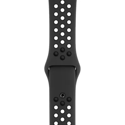 A close-up, studio shot of a black Apple Watch Nike Sport Band against a white background.