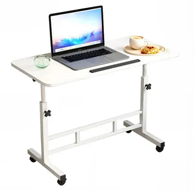 Immagine prodotto di Tavolo per laptop con rotelle - Scrivania regolabile in altezza - 65–87 cm - Piano inclinabile - Tavolo da lavoro regolabile in altezza - Tavolo da mettere sopra il letto - Bianco