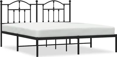 A black metal bed frame with a white mattress on a white background.
