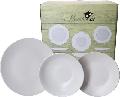 A set of white plates and a product box.