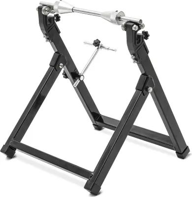 A black motorcycle wheel balancing stand.