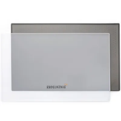 A gray silicone mat for pet bowls, with a white overlay partially covering it.