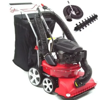 A red and black leaf blower/vacuum machine with a collection bag and accessories, isolated on a white background.