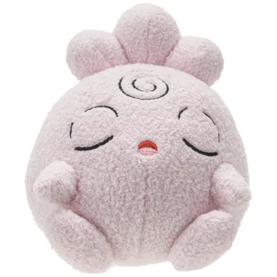 A pink plush toy of a sleeping Pokémon character.