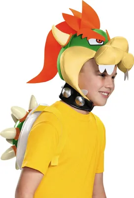 A child wearing a Bowser costume accessory set.