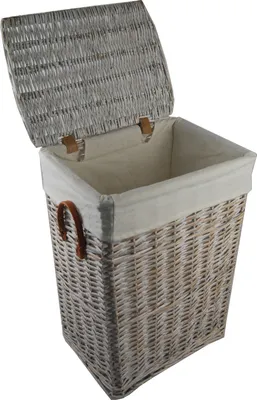 A wicker laundry basket with a lid and fabric liner.