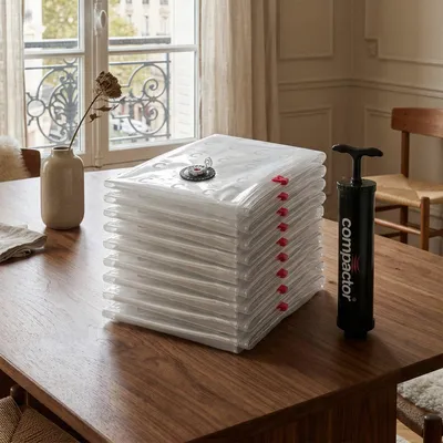 Image de COMPACTOR - Lot 10 sacs sous vide taille L + pompe manuelle - 80 x 0 x H.100 cm - Transparent