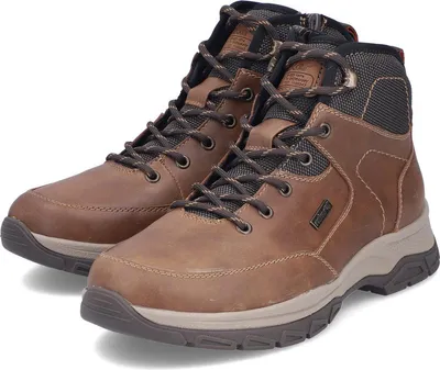 A pair of brown leather hiking boots on a white background.
