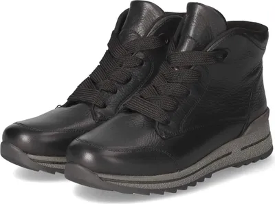 A pair of black leather boots on a white background.
