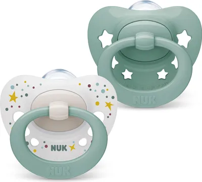 Two NUK pacifiers on a white background.