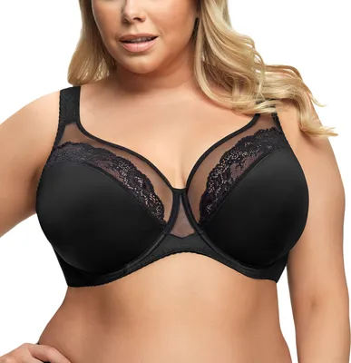 A woman wearing a black bra.