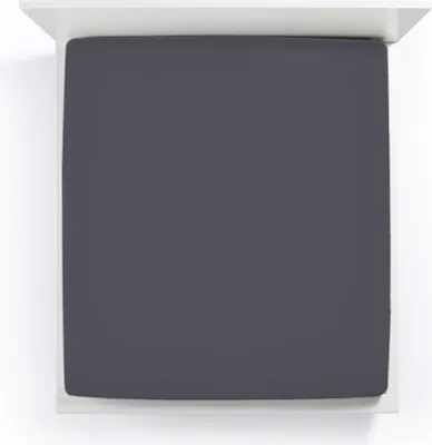 A top-down view of a fitted sheet on a mattress.