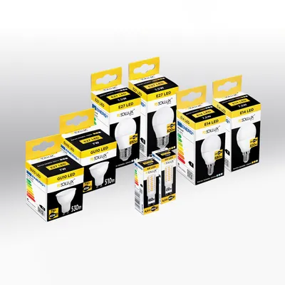 Multiple boxes of LED light bulbs arranged on a gray background.
