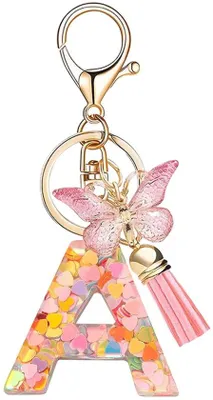 Produktbild von Kinderzimmer-Schmuckschlüsselanhänger mit Locken für Mädchen - Rosa Vlies Schmetterlings-Schmuckanhänger