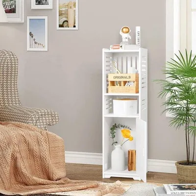 Image de Meuble de salle de bains blanc avec porte et étagère