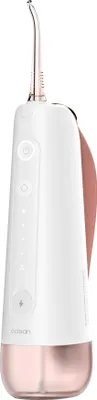 A white and rose gold oral irrigator is shown against a white background.