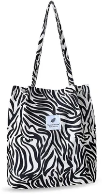 Imagen del producto de Mochila escolar grande de pana con estampado de cebra