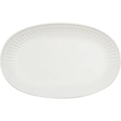 A white oval plate is shown from a top-down perspective against a plain white background.