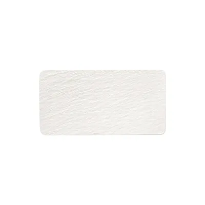 A rectangular serving platter with a textured surface.