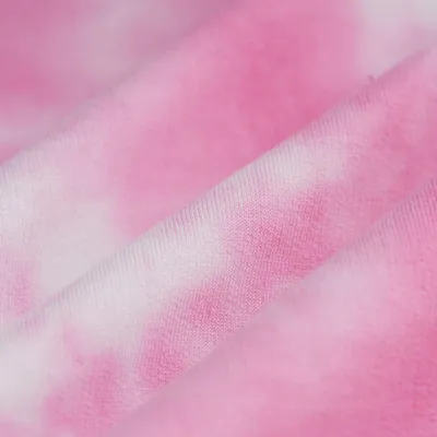 Imagen del producto de Tejido de rizo francés, algodón, poliéster, estampado tie-dye, color rosa
