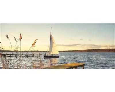 Produktbild von Glasbild Lonely Sailing Boat 80x30 cm