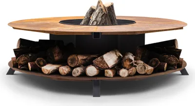 Produktbild von The Favilla Feuerkorb Fuji aus Corten-Stahl – Wetterfest mit Patina-Optik, inkl. Aschekammer & Holzlager (120×120 cm)