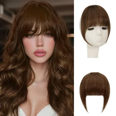 Image de Queue clip-on en véritable cheveux Remy, 100% cheveux humains, avec des reflets roux sur les tempes