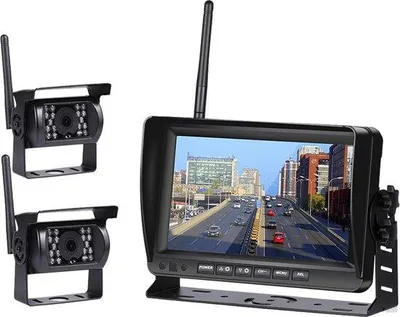 Produktbild von Rückwärtskamera mit Dashcam Set Drahtlos - 7" Bildschirm - 18 LED Nachtvisierung 15m - IP67 wasserdicht - 2 Kameras - für Auto/ Camper / Wohnmobil / LKW / Landwirtschaft / Boot / Traktor
