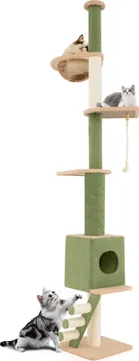 A tall, multi-level cat tree with various platforms, a hanging toy, and a cubby house, featuring two cats interacting with it.
